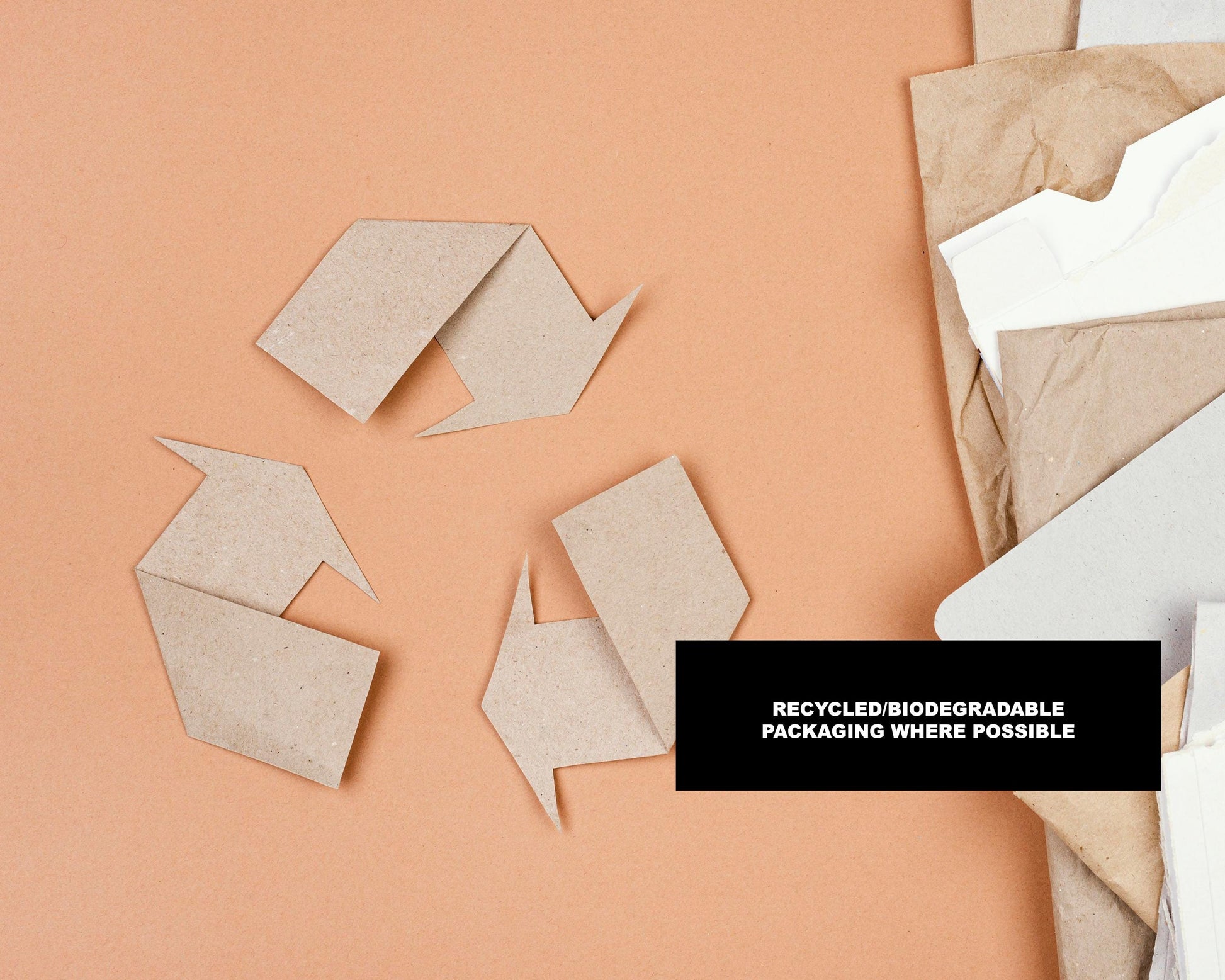 a pile of brown paper with some cut up pieces of paper